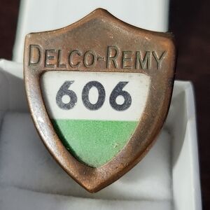 #2543, VTG 1940's GENERAL MOTORS DELCO-REMY ID BADGE PIN #606
